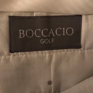 Three pair of Bocaccio Golf 44 waist shorts (white, gray, and cream).